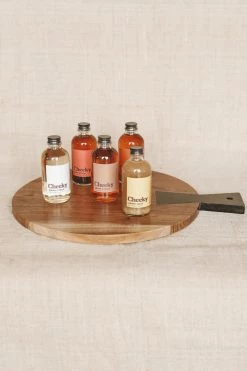CREATIVE CO-OP Home ROUND ACACIA WOOD CUTTING BOARD