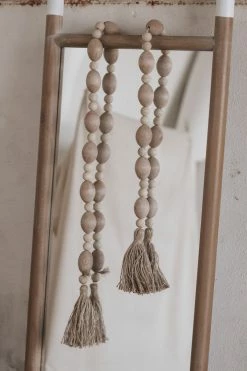 CREATIVE CO-OP MANGO WOOD BEAD GARLAND · 60"