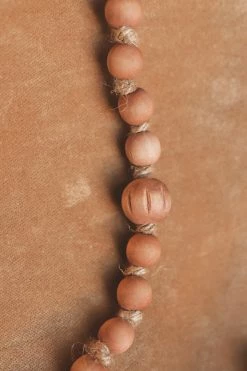 CREATIVE CO OP Home BROWN PAULOWNIA WOOD BEAD GARLAND · 72