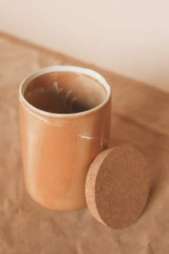 CREATIVE CO OP STONEWARE CANISTER W/ CORK LID · 8.25"