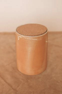 CREATIVE CO OP STONEWARE CANISTER W/ CORK LID · 8.25
