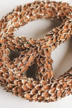 CREATIVE CO OP Home PEACE SIGN PINE NUT ORNAMENT