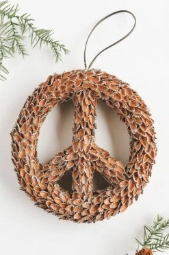 CREATIVE CO OP Home PEACE SIGN PINE NUT ORNAMENT