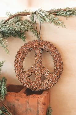 CREATIVE CO OP Home PEACE SIGN PINE NUT ORNAMENT