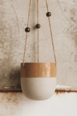 CREATIVE CO OP STONEWARE HANGING PLANTER W/ BEADS