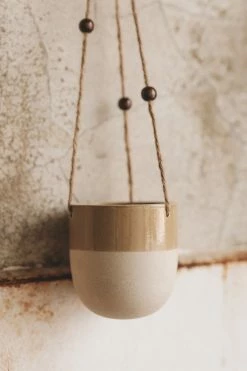 CREATIVE CO OP STONEWARE HANGING PLANTER W/ BEADS