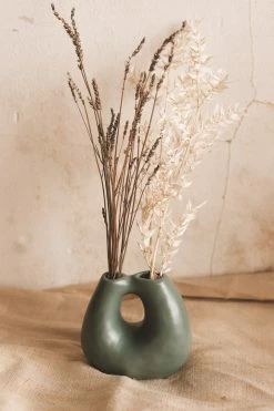 CREATIVE CO OP ABSTRACT TERRA COTTA VASE W/ TWO OPENINGS