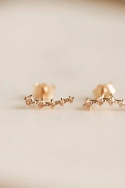 JAXKELLY STUDDED CRAWLER EARRINGS · CHAMPAGNE ACCESSORIES