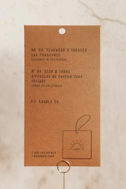 P.F. CANDLE CO. TEAKWOOD + TOBACCO CAR FRAGRANCE