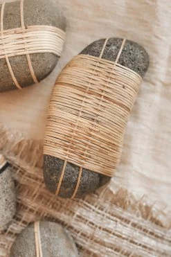 CREATIVE CO OP RATTAN-WRAPPED RIVER STONE DECOR