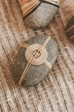 CREATIVE CO OP RATTAN-WRAPPED RIVER STONE DECOR