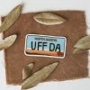 EMILY DREYER ND UFFDA LICENSE PLATE STICKER