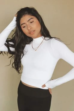 NIKIBIKI MOCK NECK CROP TOP Tops
