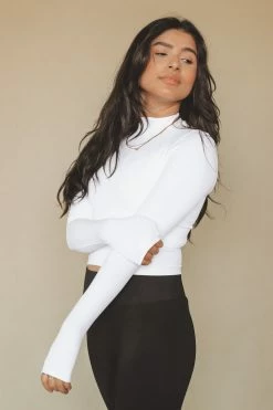 NIKIBIKI MOCK NECK CROP TOP Tops