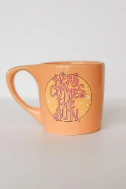 TALKING OUT OF TURN HERE COMES THE SUN MUG