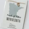 LUCKY FEATHER MINNESOTA NECKLACE · 14k GOLD LIFESTYLE