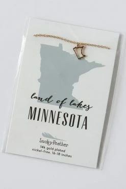 LUCKY FEATHER MINNESOTA NECKLACE · 14k GOLD LIFESTYLE