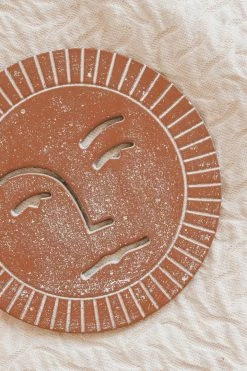 BLOOMINGVILLE DEBOSSED SUN CAST IRON TRIVET Home