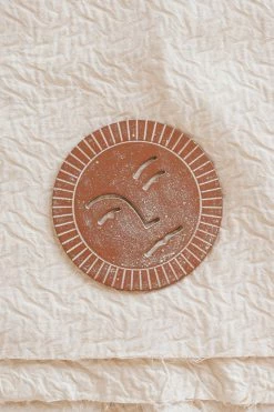 BLOOMINGVILLE DEBOSSED SUN CAST IRON TRIVET Home