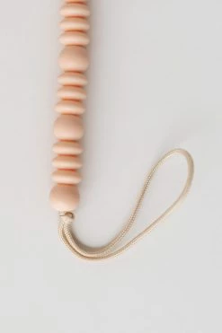 CHEWABLE CHARM GRACE PACIFIER CLIP · PALE BLUSH