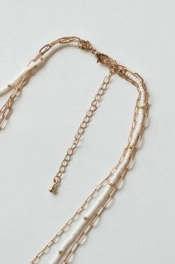 THE LUCKY COLLECTIVE WHITE BEAD + GOLD METAL LAYERED NECKLACE ACCESSORIES