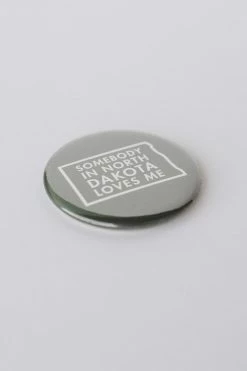 ACME LOCAL LIFESTYLE SOMEBODY IN ND BUTTON MAGNET