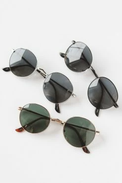 BLUE GEM LAYING OUT SUNGLASSES ACCESSORIES