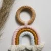 CHEWABLE CHARM LIFESTYLE RAINBOW MACRAME TEETHER · PINK + BLUE
